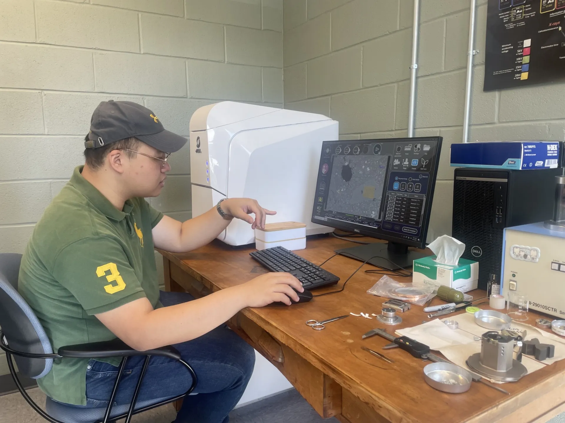 PhD Candidate Tianxiao Shen using the benchtop SEM at Lamont-Doherty Earth Observatory